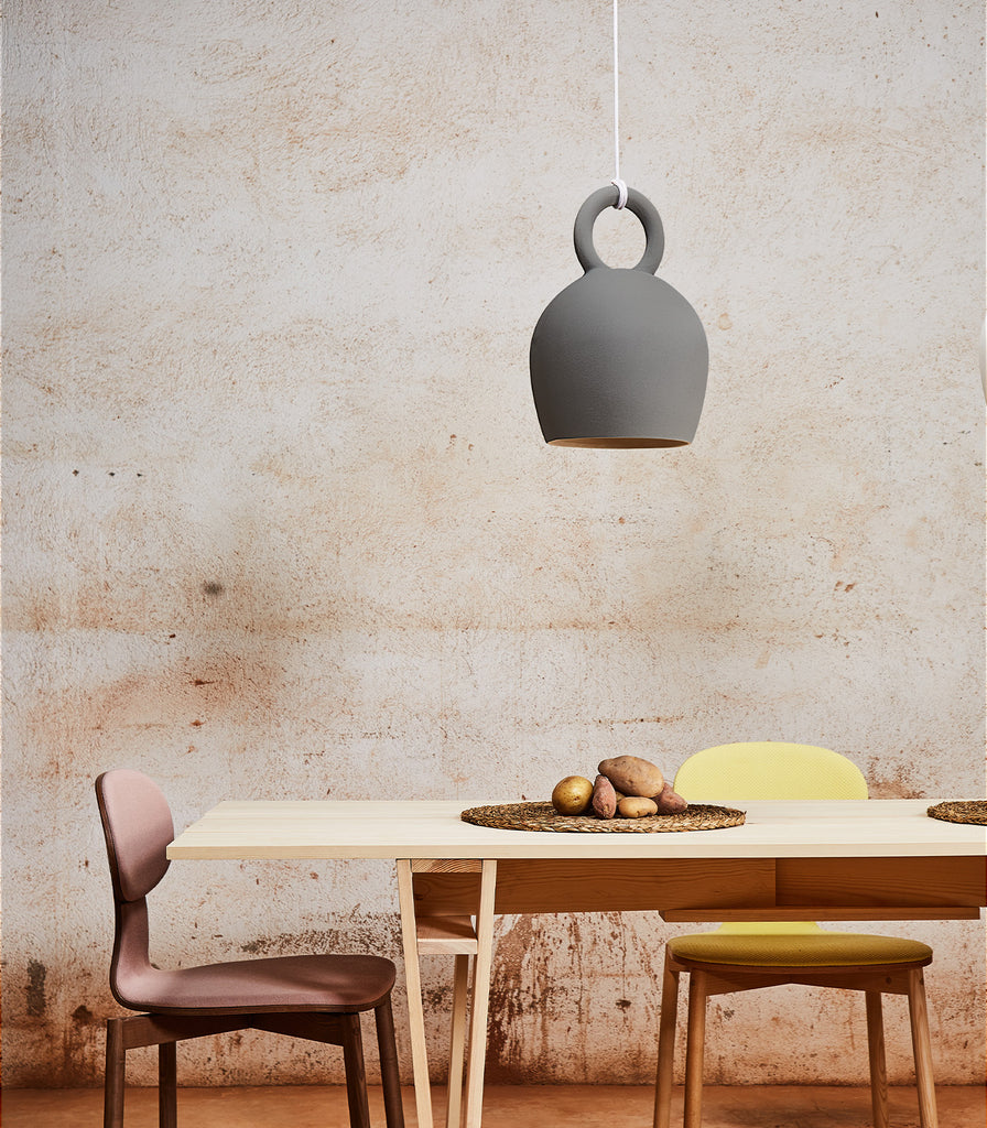 Klaylife Calo Pendant Light hanging over dining table
