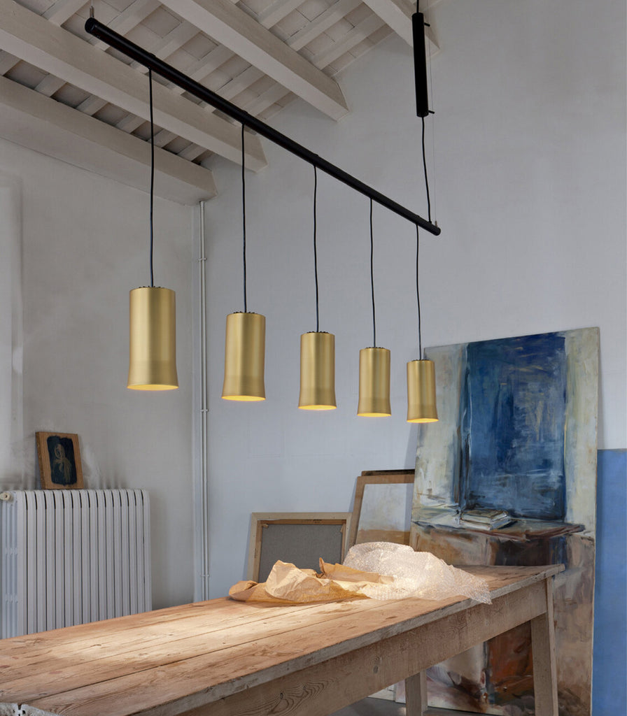 Santa & Cole Cirio Linear Pendant Light featured within interior space