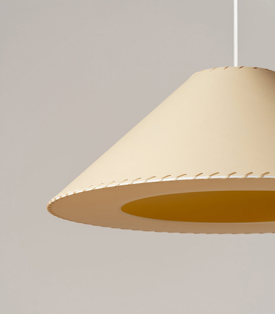 Santa & Cole Sisisi Conicas Planas Pendant Light featured within interior space