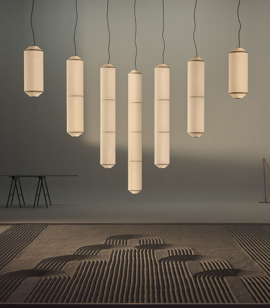 Santa & Cole Tekio Vertical Pendant Light featured within interior space