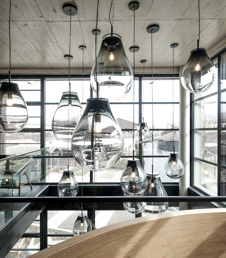 Bomma Tim Silver Pendant Light featured within interior space