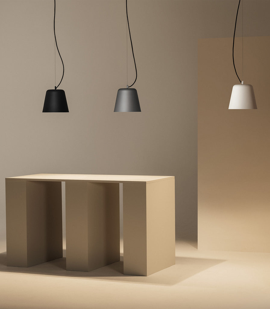 Santa & Cole Vaso Pendant Light featured within interior space