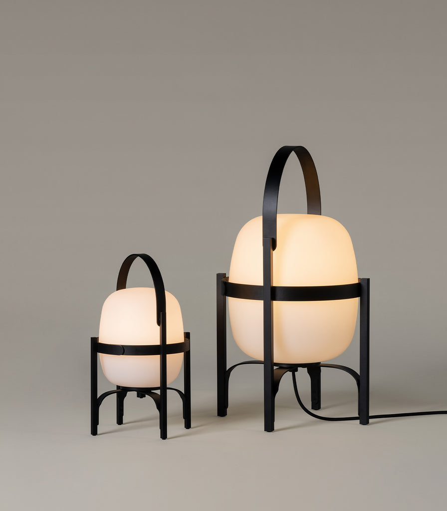 Santa & Cole Cesta Outdoor Table Lamp featured within outdoor space