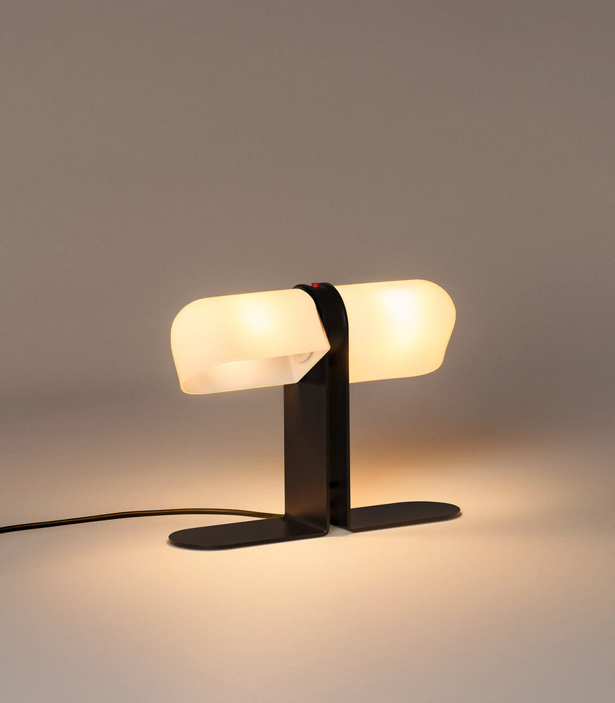 Santa & Cole Duo Table Lamp featured within interior space
