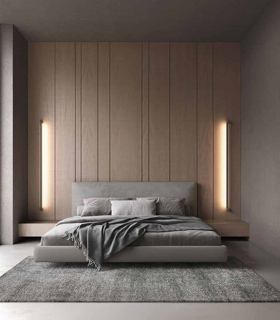 Karman Turn It Wall Light featured within interior space