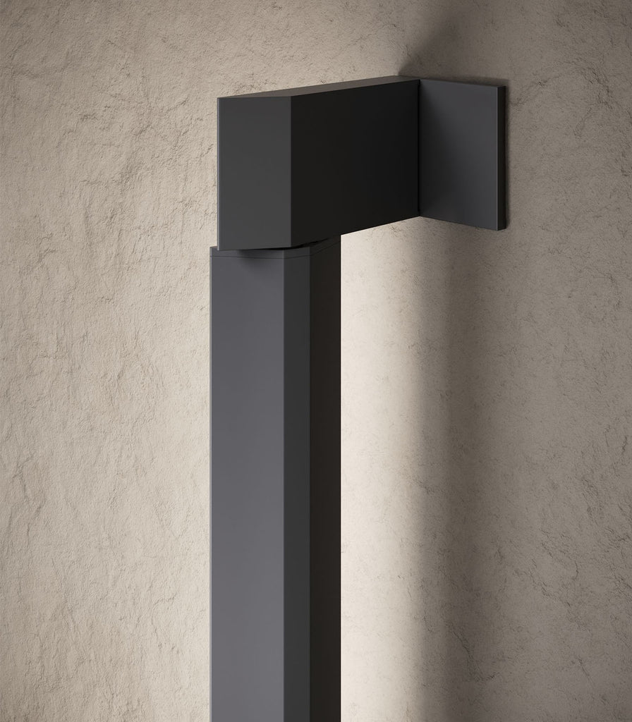 Karman Turn It Wall Light featured within interior space