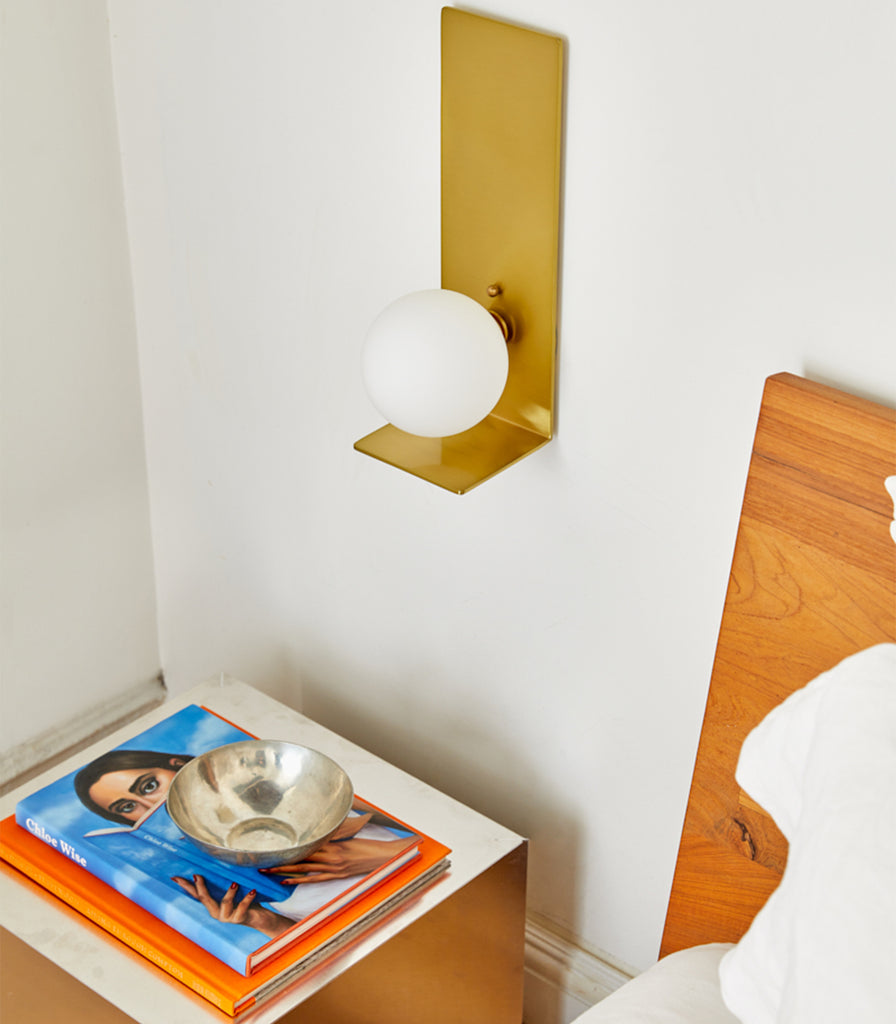 Hudson Valley Lani Wall Light featured above bedside table