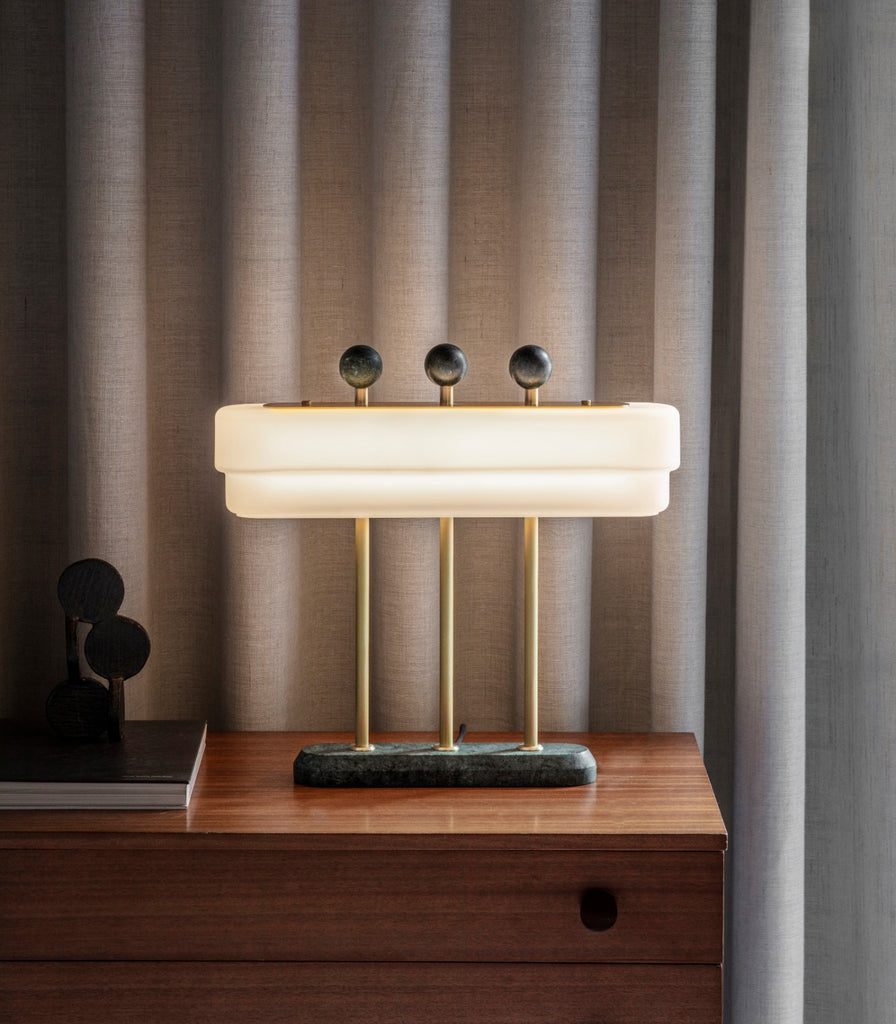 Bert Frank Spate Table Lamp placed over table
