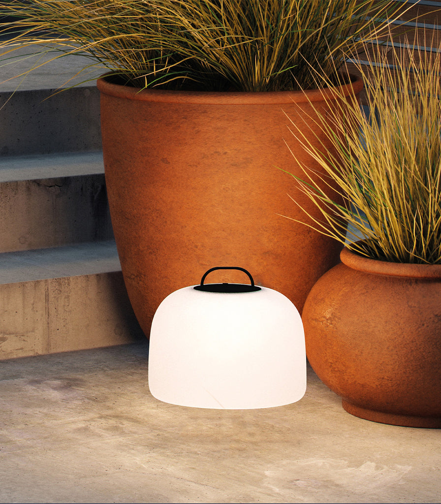 Nordlux  Kettle Tripod Table Lamp featured within outdoor space