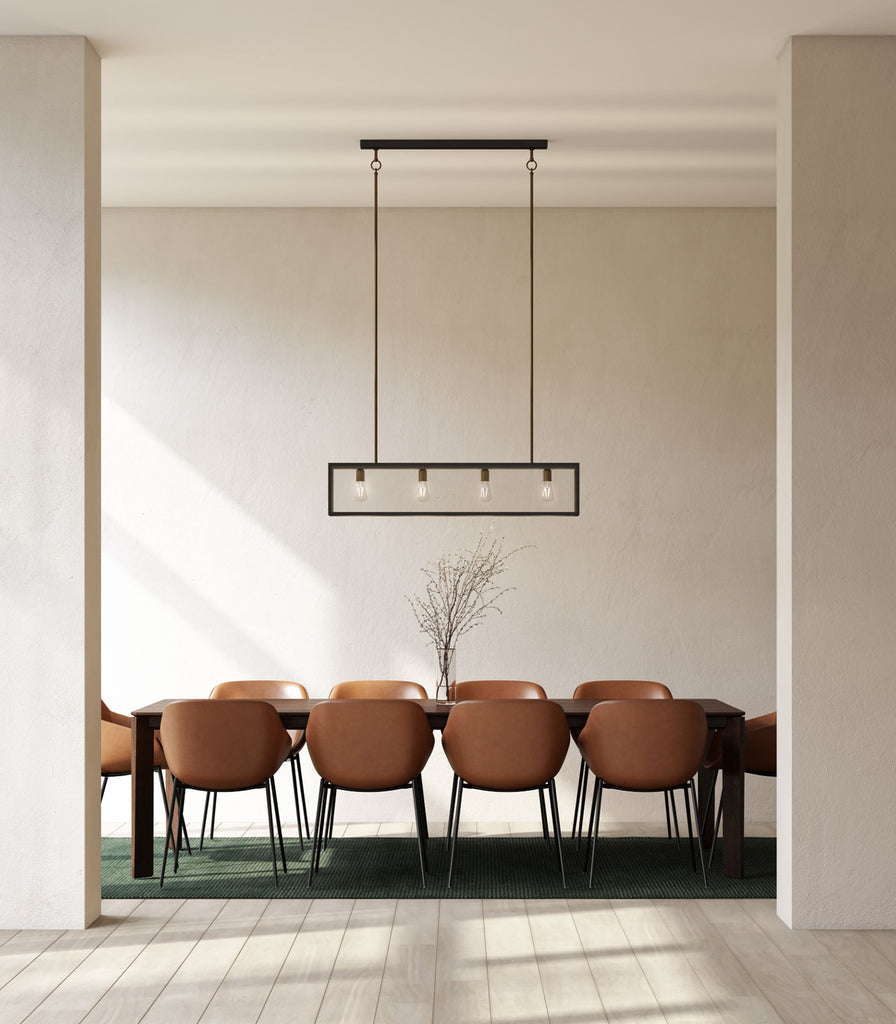 Lighting Republic Dover Linear Pendant Light in Clear with 3 light hanging within a contemporary dining interior