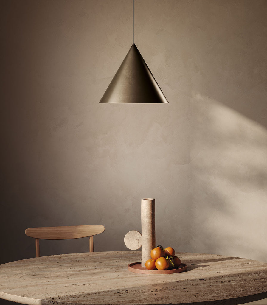 Il Fanale Cone Pendant Light hanging over dining table