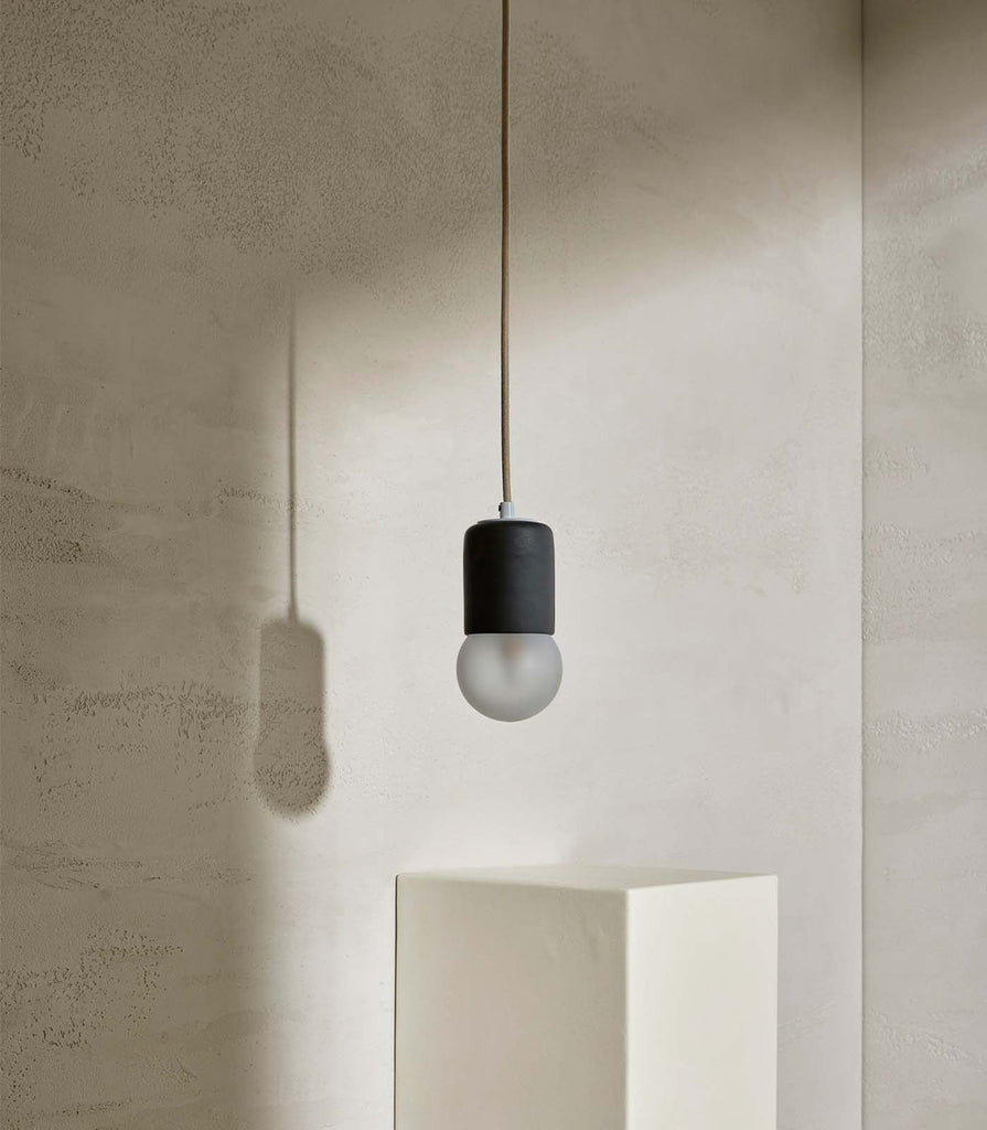 Marz Designs Terra Cylinder Pendant Light featured within interior space