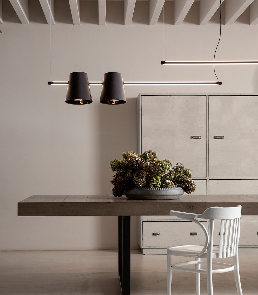 Karman Cupido Pendant Light featured within a interior space