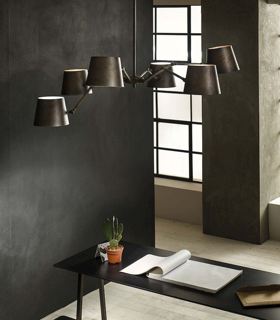 Il Fanale Reporter Chandelier featured within a interior space