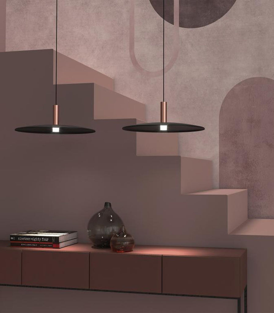 Norlys Chapeau Pendant Light in Copper/Black featured within a interior space