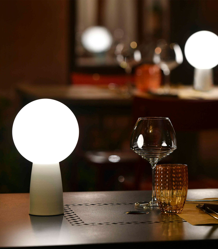 Ai Lati Olimpia Table Lamp placed over dining table