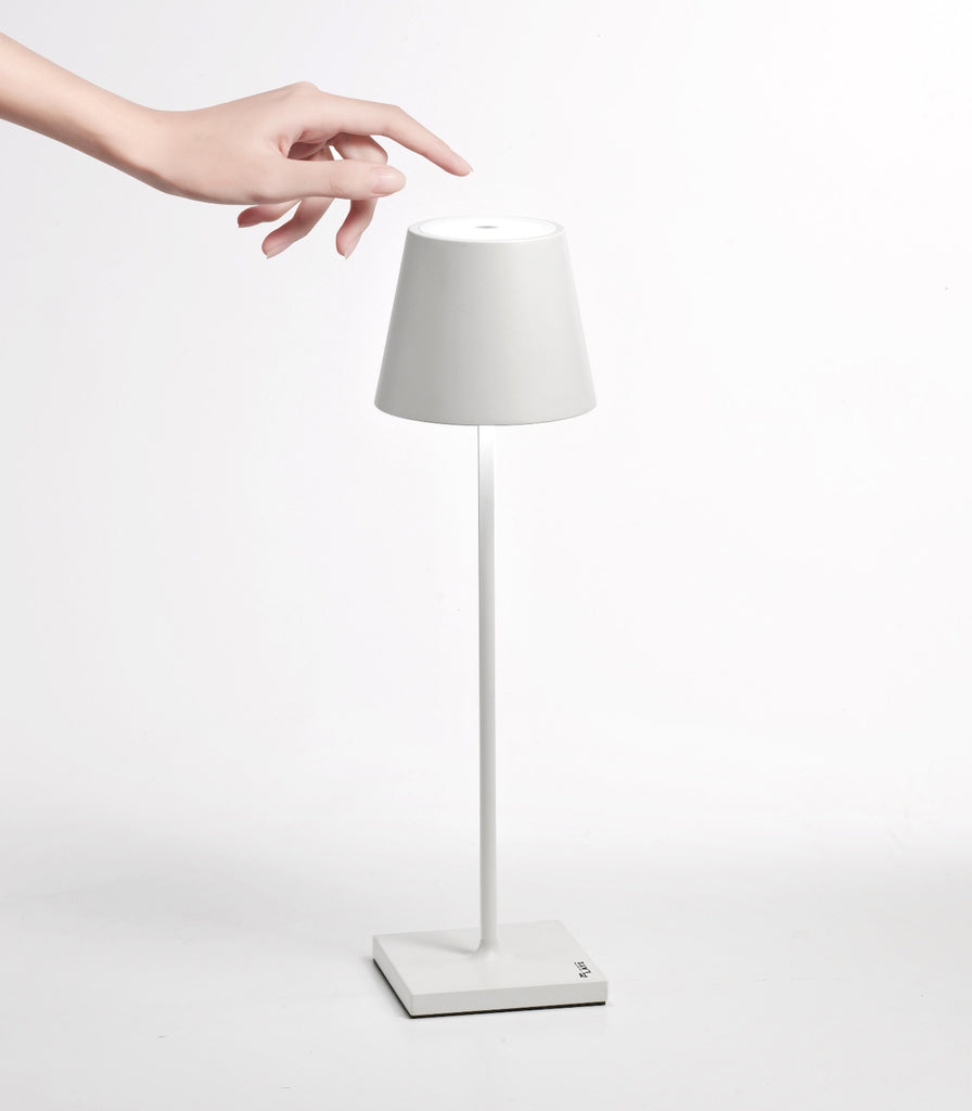 Ai lati Poldina Table Lamp featured within a outdoor space