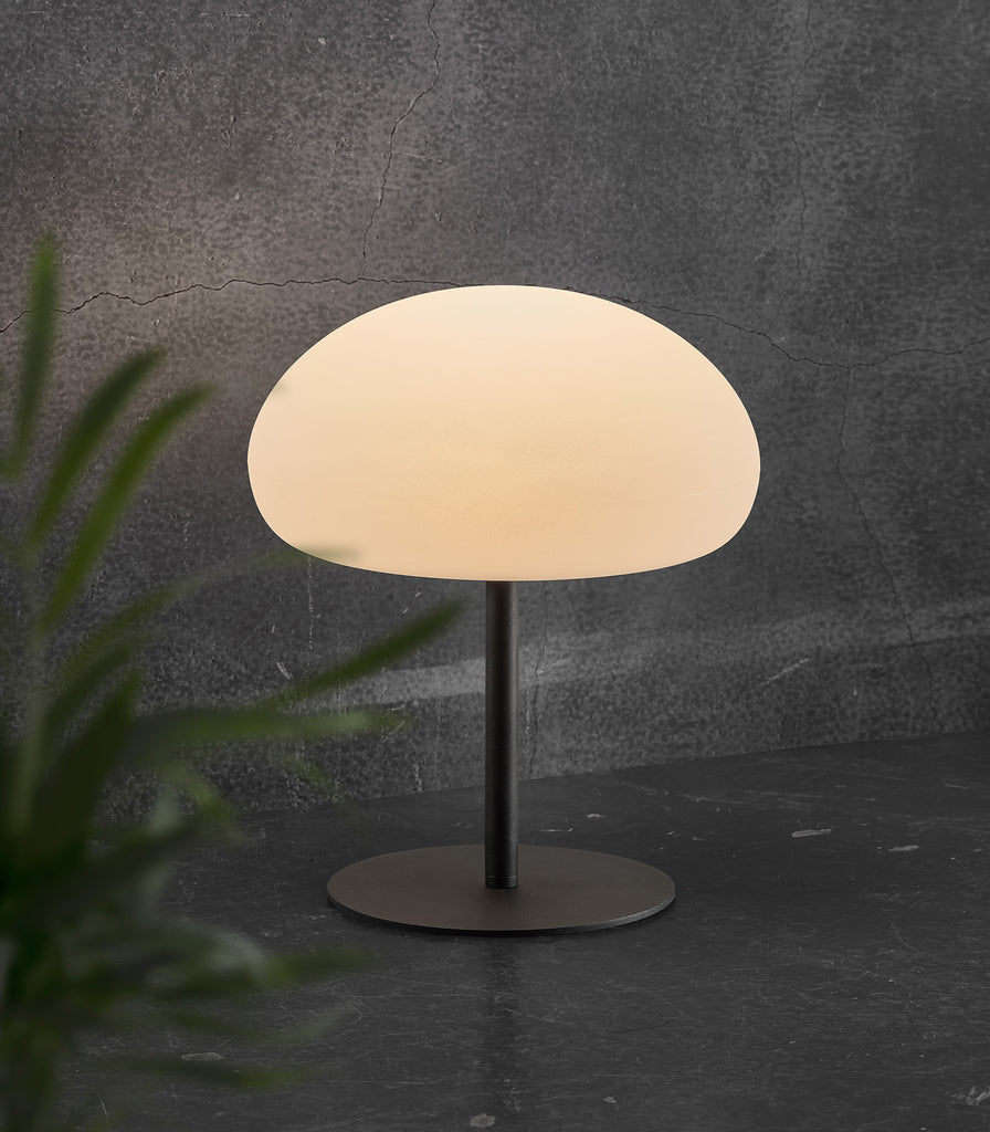 Nordlux Sponge Table Lamp featured within outdoor space