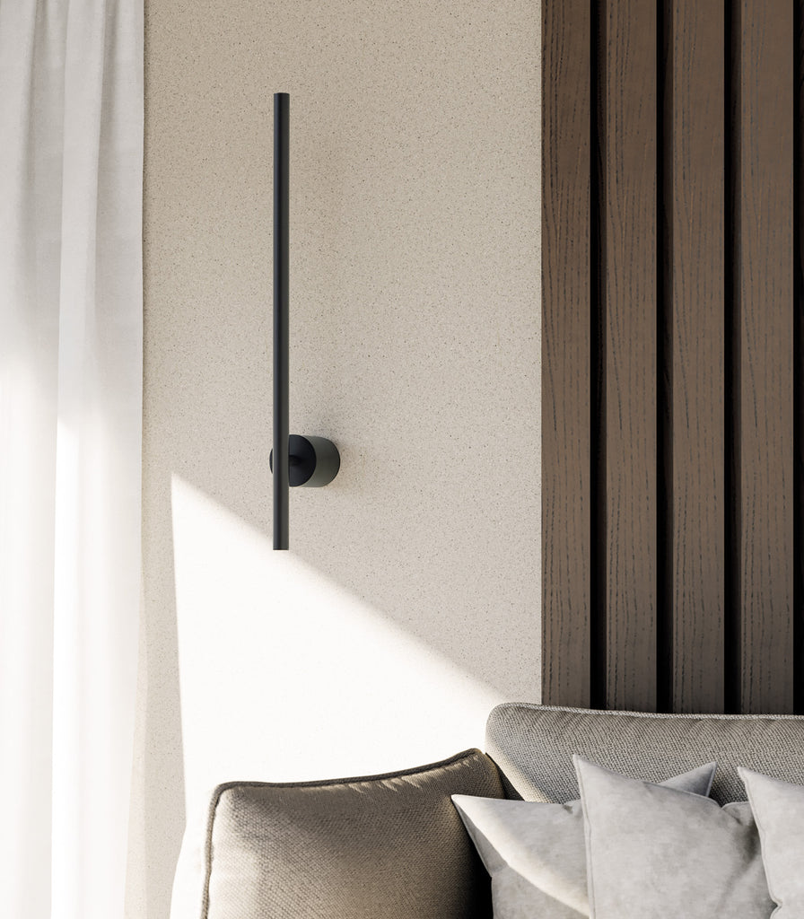 Aromas Clock Wall Light featured within interior space