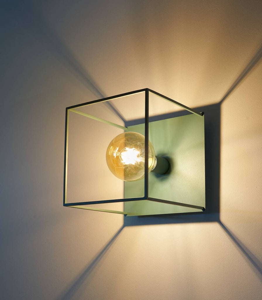 Box Wall Light by Zava in Arctic Green turned on