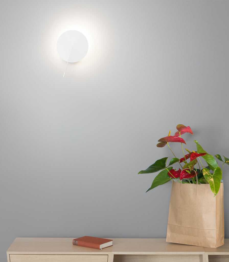 Estiluz Obs Wall Light featured within interior space